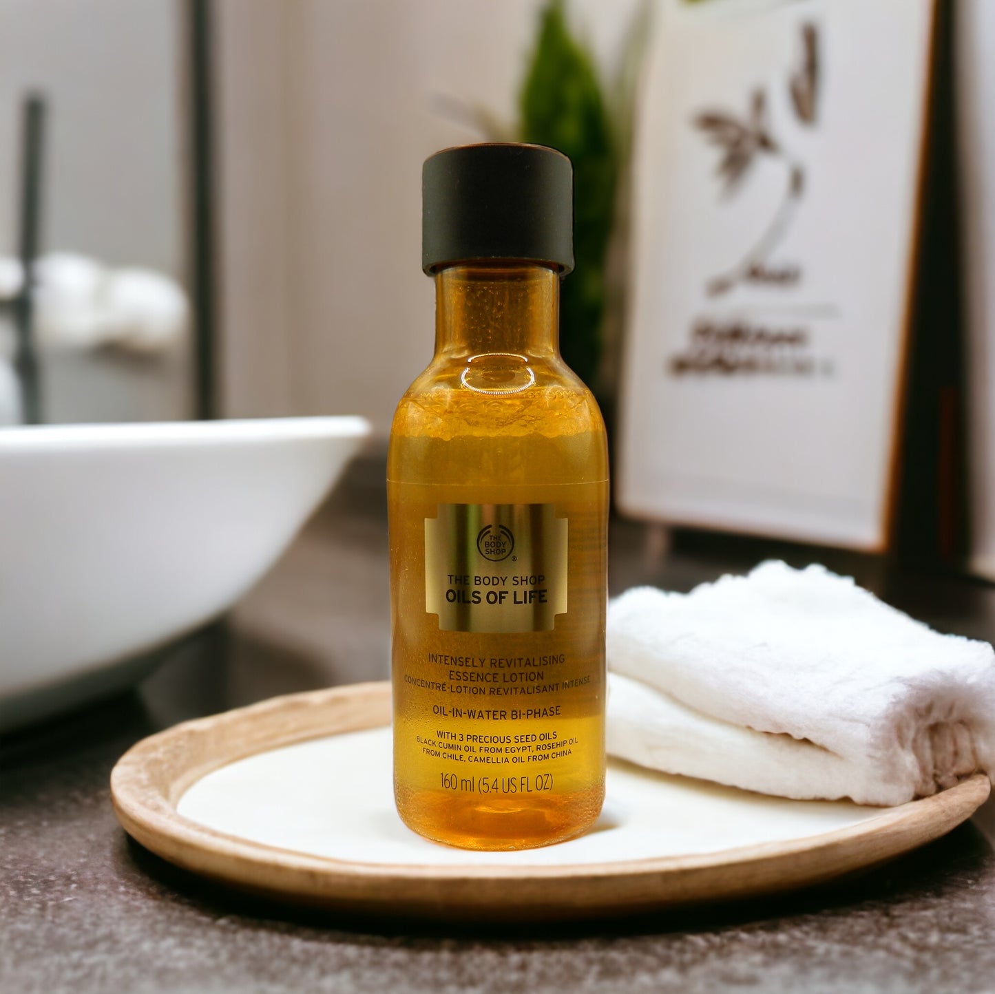 The Body Shop Oil of Life Intensely Revitalising Essense Lotion 160ml